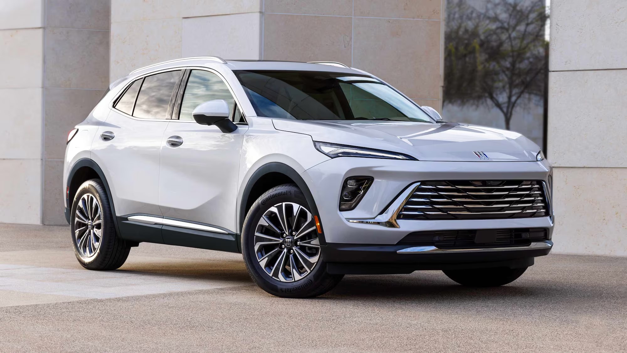 New 2024 Buick Envision parked in a plaza